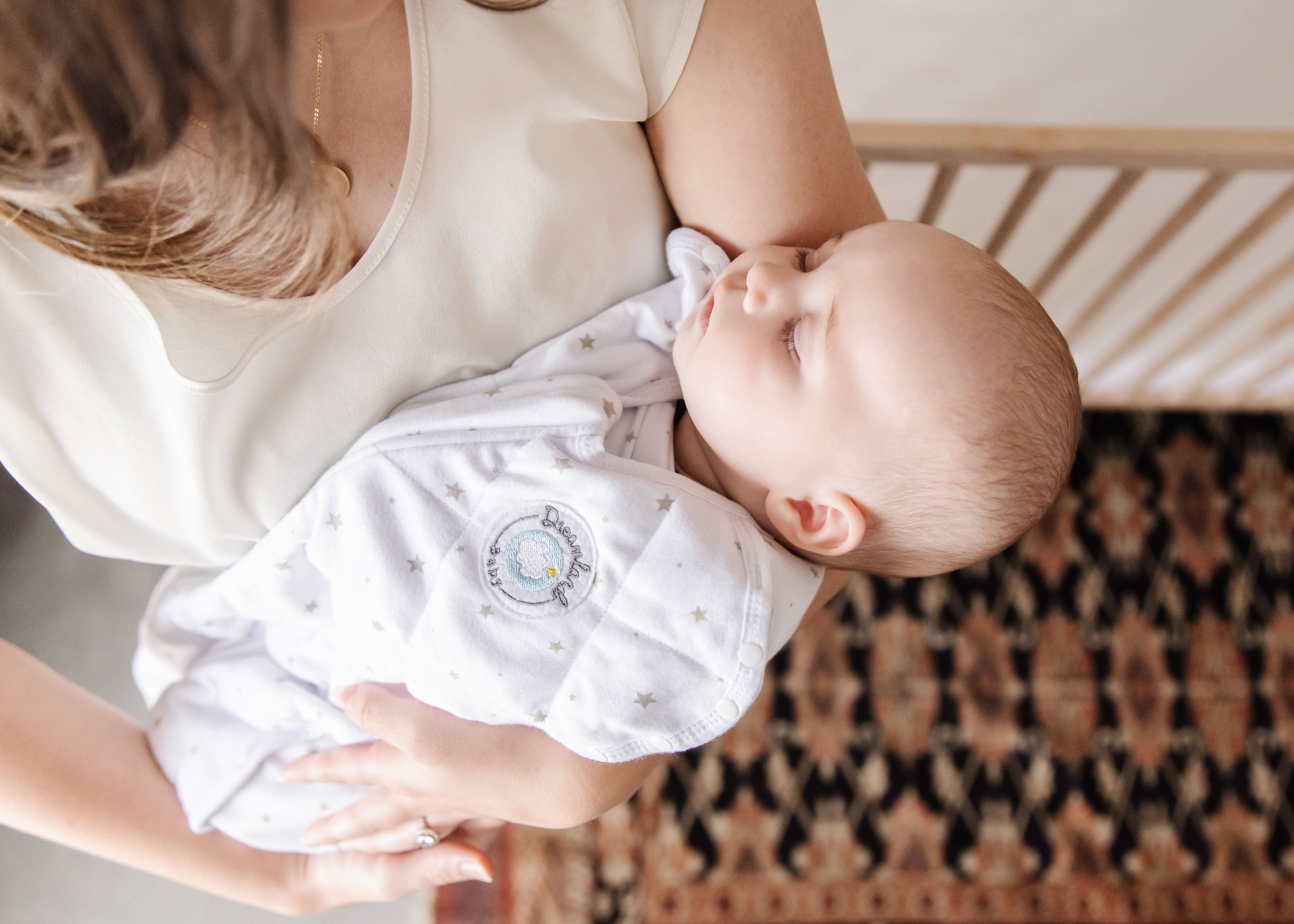 How to Get Your Baby to Sleep Without Being Held | Dreamland Baby