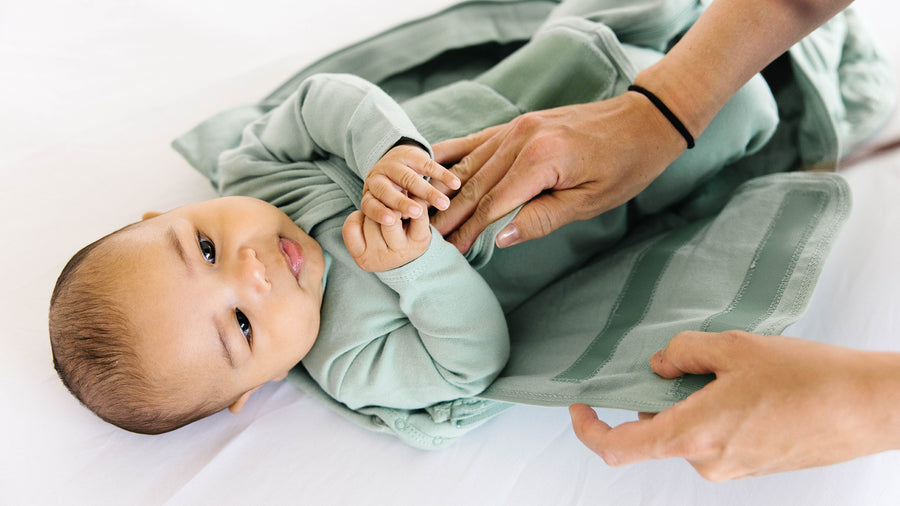 Do Babies Stop Wearing Footie Pajamas? Baby Footie Pajama FAQs – Dreamland Baby
